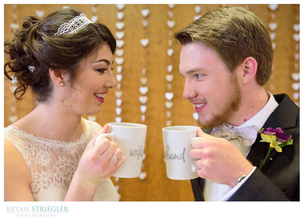 bride and groom with custom coffee cups